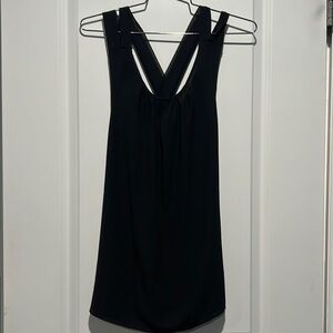 Naked Zebra X back sleeveless blouse. Size medium.